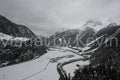 Mountain village nestled in snowy valleys