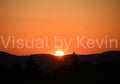 Sun disappears behind the hill