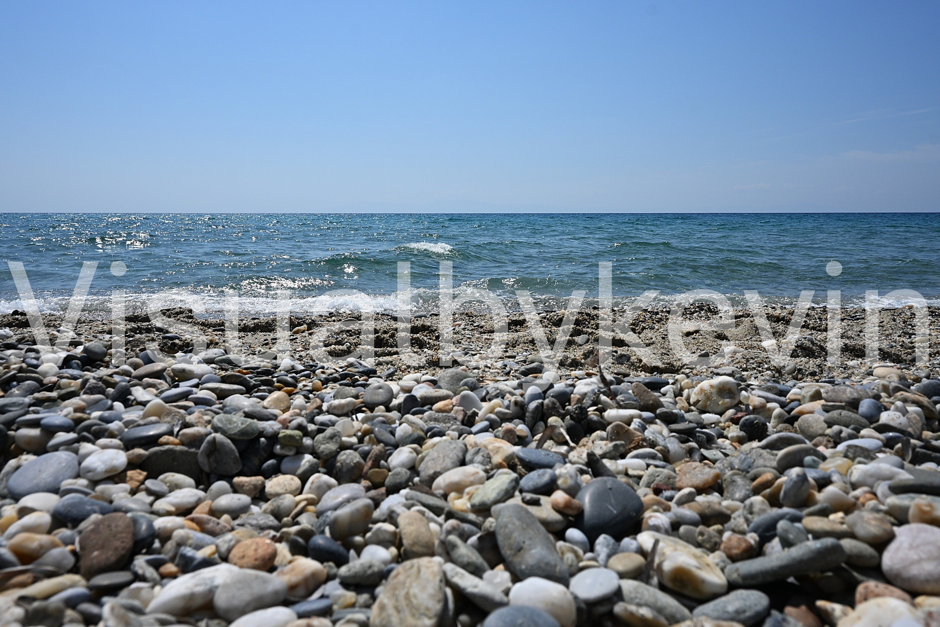 Pebble bank in the surf